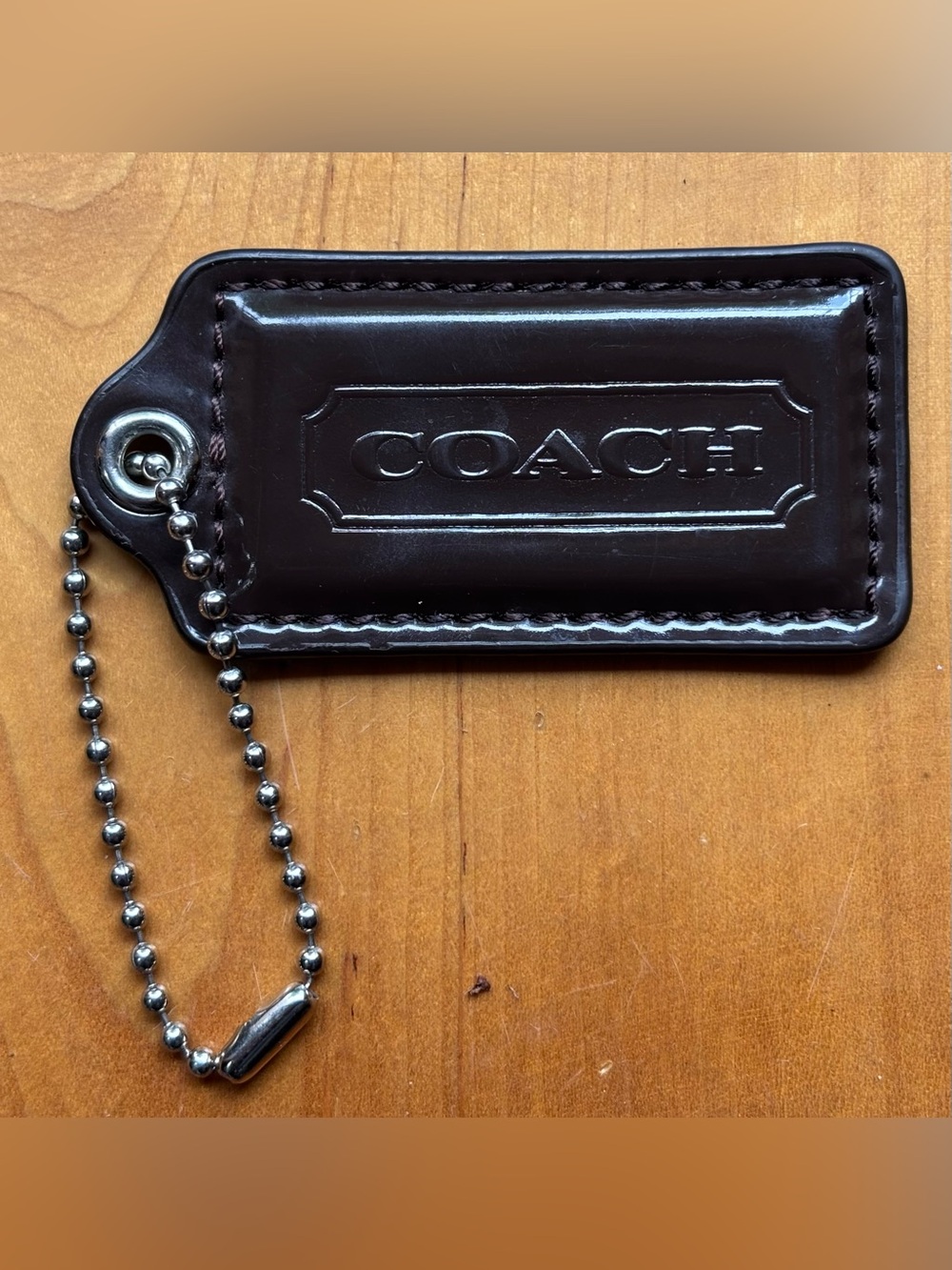 COACH Tag